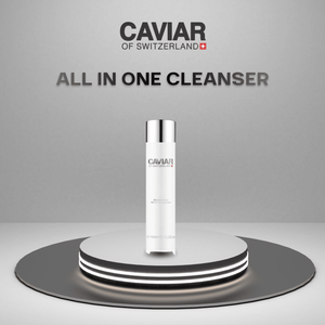 All-in-One Micellar Cleanser bottle on a lit podium
